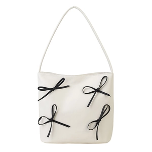 Minimalistische beige Shopper-Tasche mit schwarzen Schleifen im geräumigen Eimer-Stil