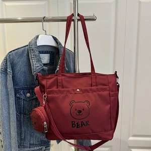Dark red canvas bear print tote bag with small round coin pouch and dual shoulder straps