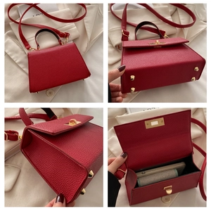 Detailed views of red lychee grain crossbody bag with gold hardware and interior space