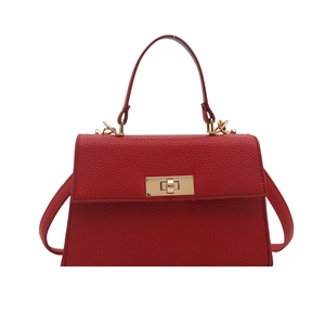 Chic red faux leather tote bag with lychee texture and golden metal twist lock closure