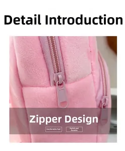 Close-up of the smooth pink plush fabric and durable zipper closure on this kids backpack
