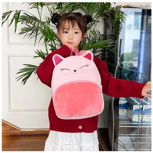 Close-up of pink plush cat backpack featuring detailed embroidery and glitter ears
