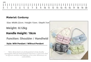 Detail view of corduroy plaid crossbody bag showing size 22x13x7cm with star pendant