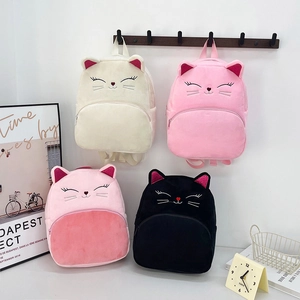 Cute plush cat backpack for kids in four colors featuring soft faux fur and cat embroidery