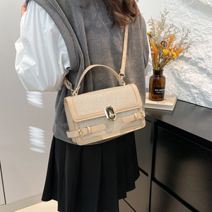 Beige contrast small square handbag with glitter texture and gold-tone twist lock