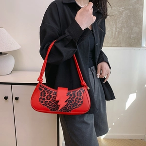 Fashionable red leopard print underarm bag for women with stylish lightning bolt buckle