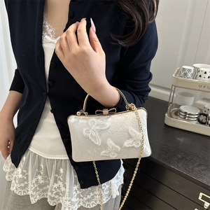 Elegant white lace clutch bag with butterfly embroidery and golden chain strap