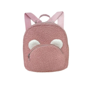 Pink plush teddy bear backpack for kids featuring cute white ears and front zipper pocket