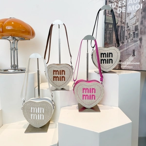 Chic heart-shaped woven crossbody bags with letter accents in four stylish colors