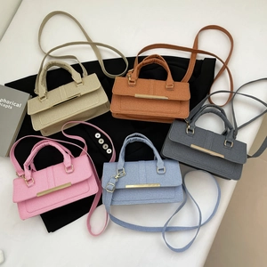 Chic women's crossbody handbags in five pastel colors with gold metal buckle detail