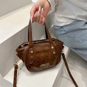 Retro PU Leather Bucket Bag For Women Fashion Handbag With Metal Rivets Adjustable Shoulder Strap Crossbody