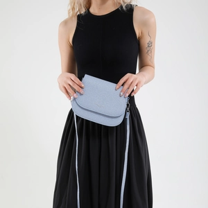 Minimalist light blue textured saddle crossbody bag with silver logo for women