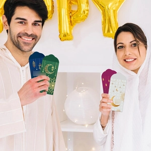 Eid and Ramadan money envelopes with golden crescent and mosque patterns in assorted colors