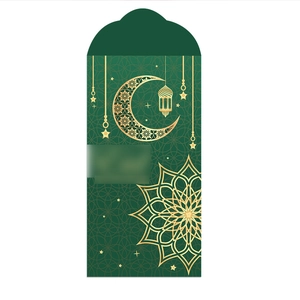 Detail of green Muslim Eid red packets with gold crescent moon and lantern patterns