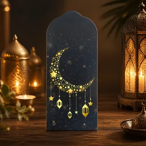 Detail of dark grey Eid Mubarak envelope featuring gold moon and hanging fanous lanterns