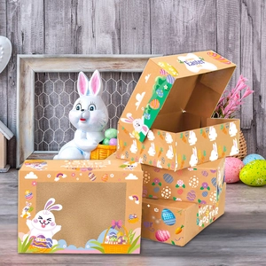 Easter gift candy boxes with cartoon rabbits and clear windows on wooden background