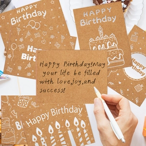 Handwritten Happy Birthday kraft paper card with envelope and festive cake background