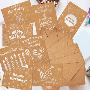 DIY kraft paper Happy Birthday cards set with laser cut designs and matching envelopes