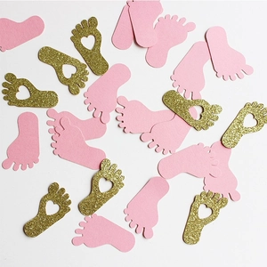 Confettis pieds de bébé rose et or pour décoration de table de fête de révélation
