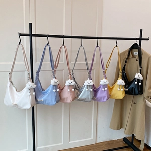Minimalist faux leather crossbody bag with cloud pendant available in multiple colors