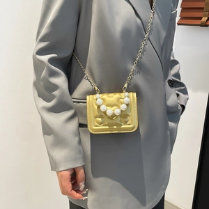 Girls' gold metallic crossbody bag with heart texture, pearl handle and chain strap