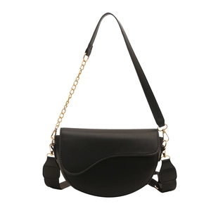 Minimalist black saddle bag with golden chain and wide strap on white background