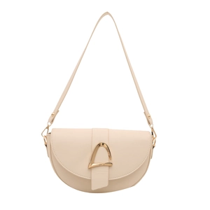 Creamy saddle bag with elegant gold buckle and shoulder strap in a modern minimalist style