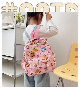 Pink cartoon kids backpack featuring cute bear charms and adjustable soft straps