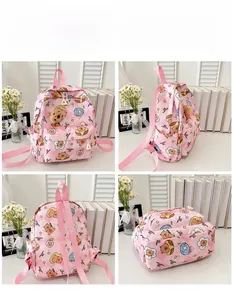 Detailed four-way view of pink cartoon schoolbag featuring checkerboard and bear prints