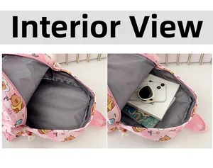 Internal display of pink cartoon children backpack showing spacious compartments and pockets