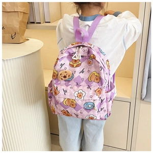 Rear view of child wearing purple cartoon bear backpack with cute checkered pattern