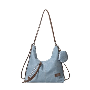 Minimalist light blue tote bag with adjustable brown strap and matching round coin purse