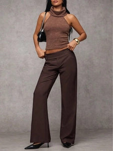Pantaloni da completo a gamba larga a vita alta da donna con top in maglia senza maniche