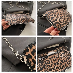 Detailed views of leopard print crossbody bag with silver studs and metal chain strap