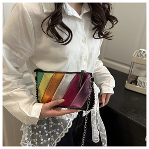 Detail of rainbow metallic crossbody bag with chain strap and beaded trim detail