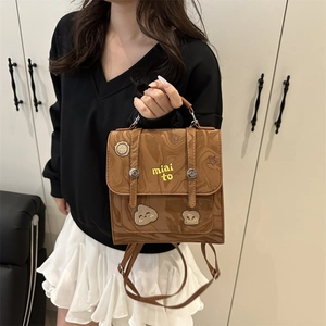 Vintage brown marble-textured backpack with cute embroidery patches and top handle