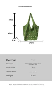 Detailed view of green knitted tote with rainbow beads showing precise size specifications