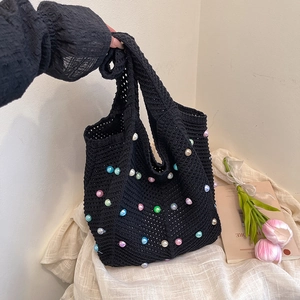 Handmade black crochet tote bag with colorful faux pearls for summer beach vacations