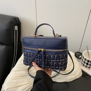 Vintage navy blue tweed and leather box bag with crossbody strap and gold-tone weaving