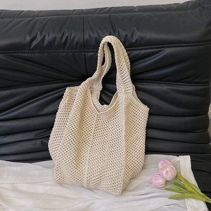 Chic hollow out knit tote bag in cream white featuring large capacity and handmade crochet