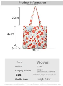 Detail view of floral tote bag with blue star charm showing 32x32x8cm dimensions