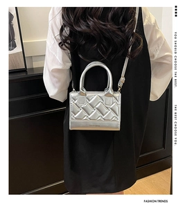 Detail of silver quilted PU leather mini crossbody bag with Fashion & Bags lettering