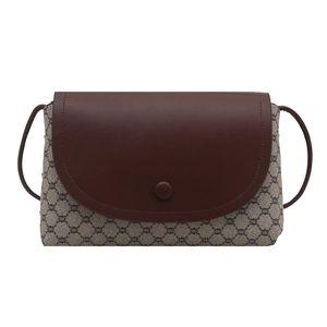 Borsa a tracolla retrò con patta in pelle bordeaux e trama floreale a contrasto