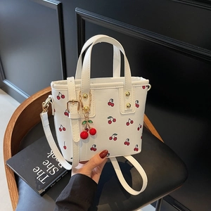 Sac seau en cuir blanc à motif cerise avec poignées et bandoulière amovible