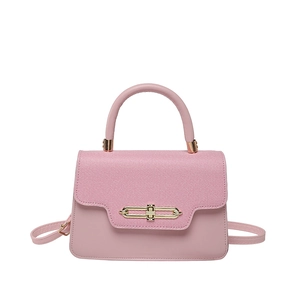 Pink minimalist crossbody bag with textured stitching and a gold metallic lock closure