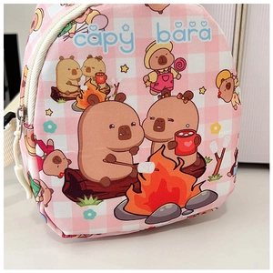Close-up of Capybara camping print on pink checkered canvas kids crossbody bag