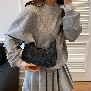 Black snake skin texture baguette bag with elegant gold chain strap for women