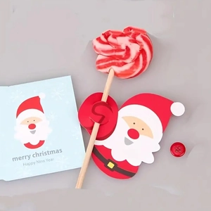 Detail of Santa Claus lollipop decorative paper cards for Christmas party favors
