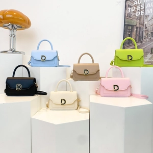 Fashionable mini square leather crossbody bag collection with gold D-buckle and top handle