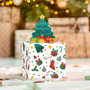 Detail of Christmas candy gift box with pop-up tree design and festive patterns